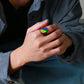 Spectrum Strength: Black and Silver Rings Burst with Pride